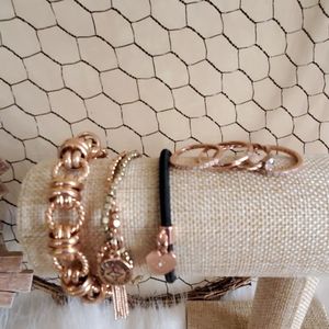 Rose gold bracelets and stacking rings